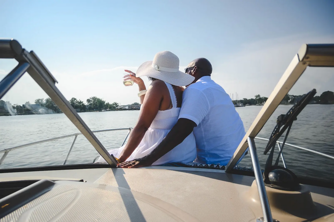 Couple sitting together on the deck enjoying the bay views